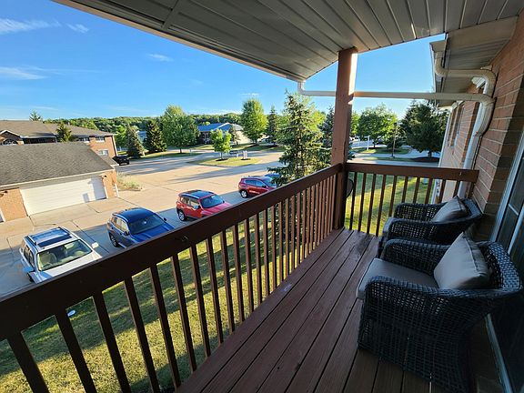 Balcony overlooking neighborhood and serene nature views