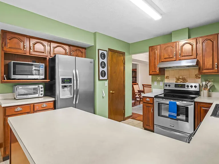 Full kitchen. Full size refrigerator, stove, microwave and dishwasher.