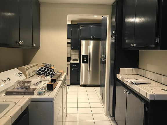 dedicated laundry room with even more storage