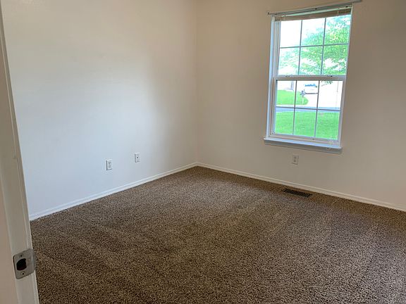 Front bedroom with walk in closet