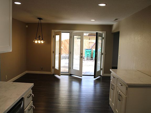 From Kitchen to Dining room with patio doors