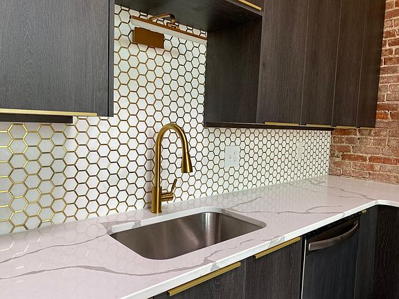 Designer fixtures, backsplash and countertops