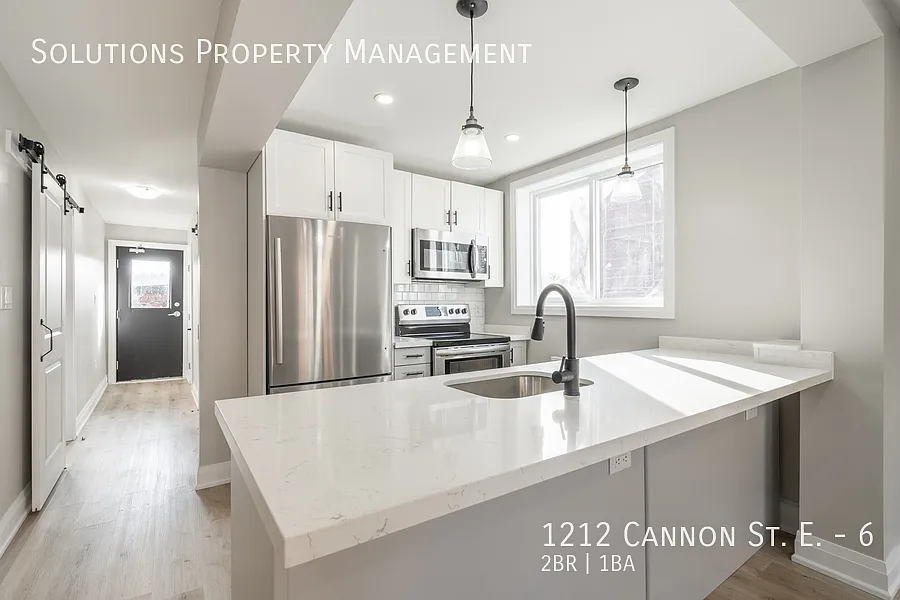 **2 bedroom Unit with Modern finishes! — Photo 1