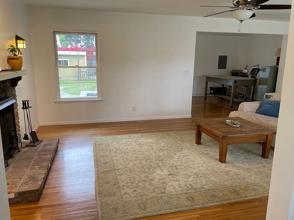 looking across living room into office area