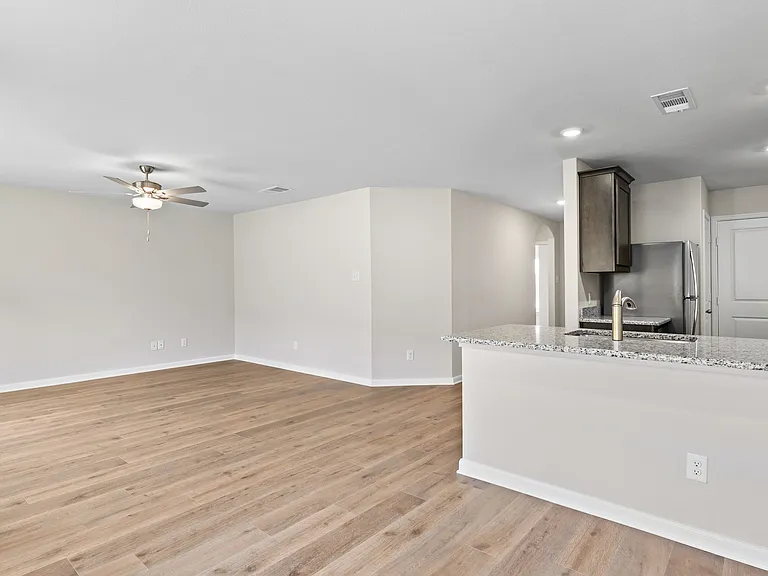 The dining room sits right off of the kitchen and spacious living room.
