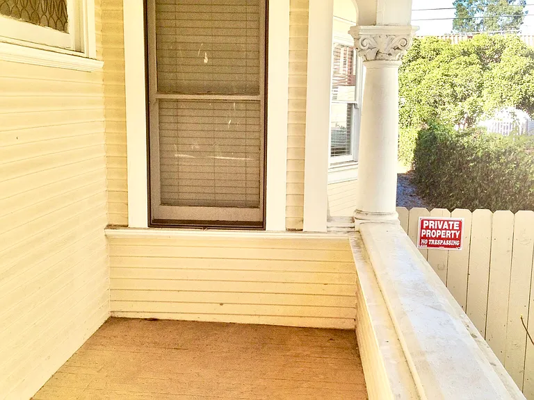 Elegant front entrance at 1223 - historic USC housing with modern security features