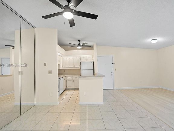 2nd image of 9446 S Belfort Cir #215