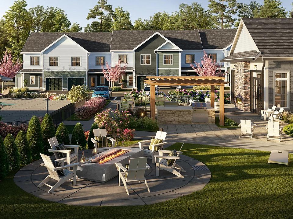 Activity lawn with outdoor games, firepit, grills, and comfortable seating.