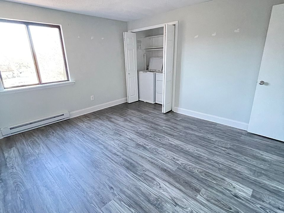 front bedroom with washer/ dryer