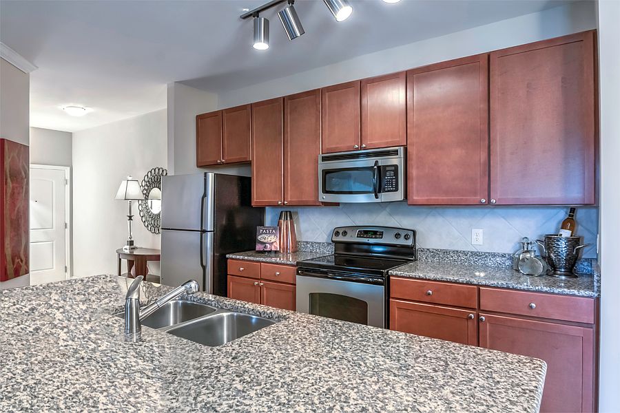 Open kitchens with 42" cabinetry and expansive kitchen islands available