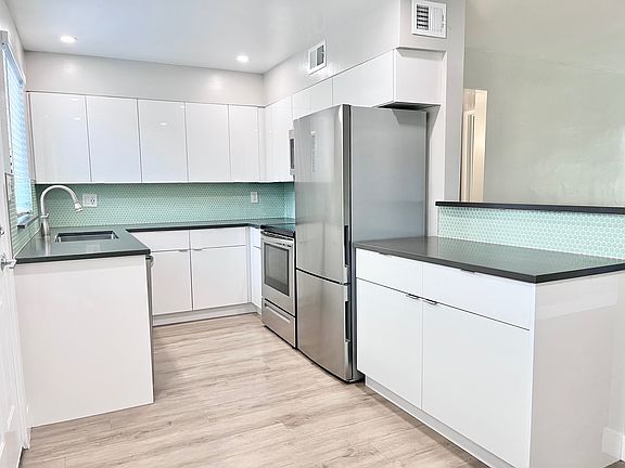 4th image of 6824 E 4th St APT 11