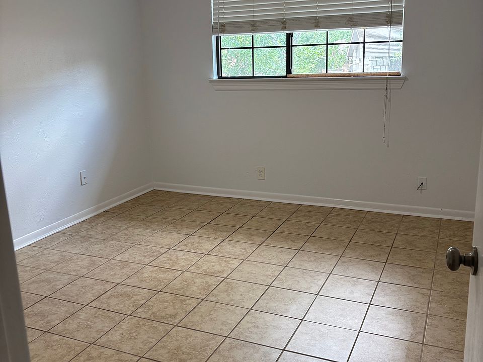 2 bedrooms identical size. Tile throughout entire property.