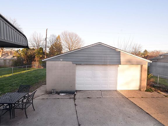 almost a 3 car garage... extra deep w/ garage door opener