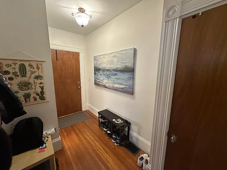 private foyer with large storage closet