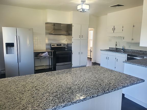 Kitchen looking toward mudroom with sink