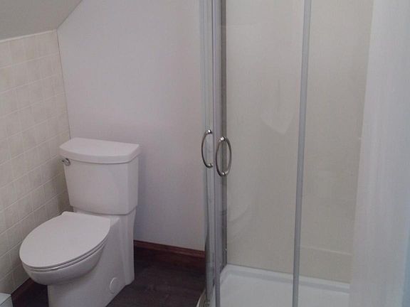 Brand new bathroom. Dimensions are 6' x 7'.