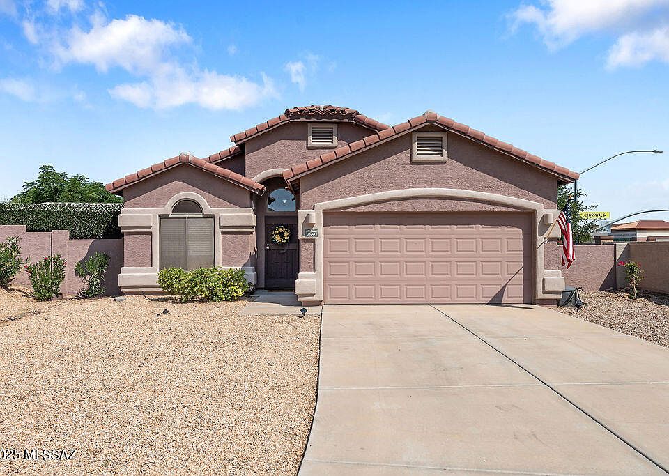 1st image of 7659 N Hemingway Pl