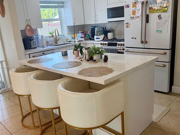 4th image of 6497 W 8th Ln #6497