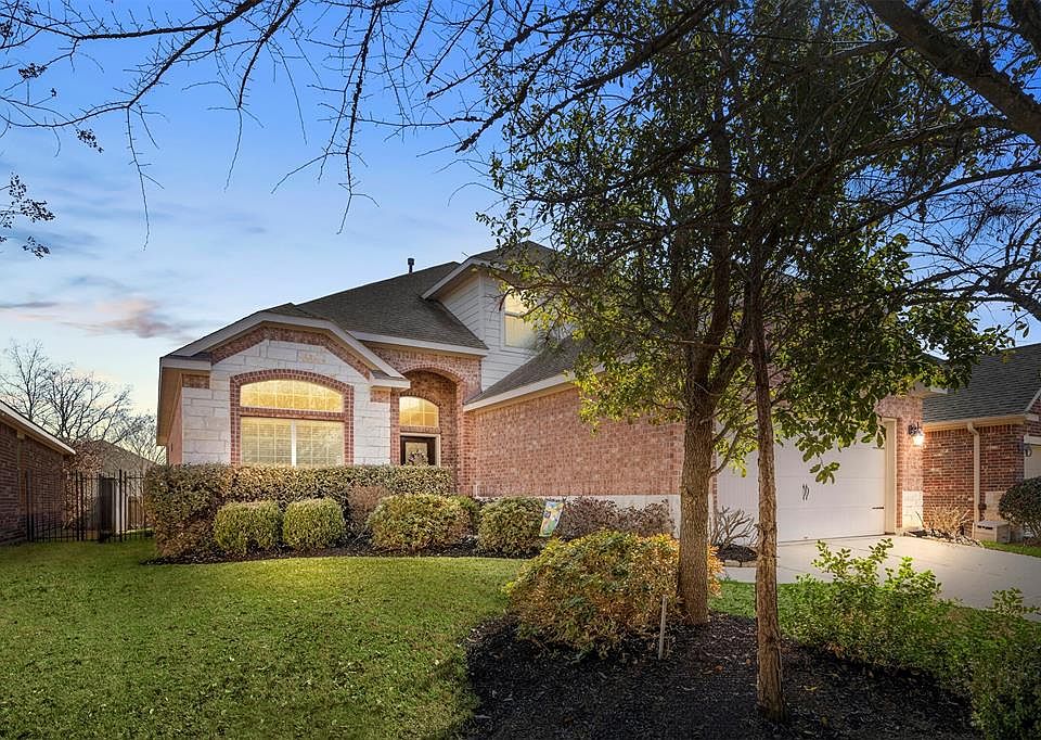 Beautiful brick and stone elevation! Welcome to 199 Black Swan - your future home!