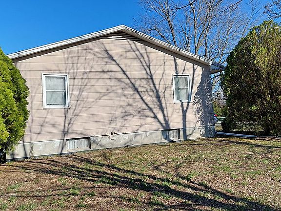 W side of house looking E