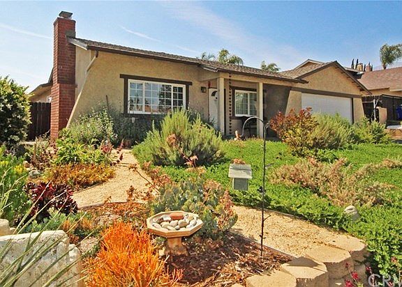 Professionally landscaped with drought tolerant plants