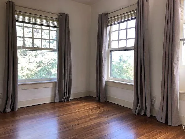 Bedroom 2 corner windows w/curtains
