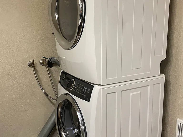 Full size Electrolux washer and dryer in the bathroom