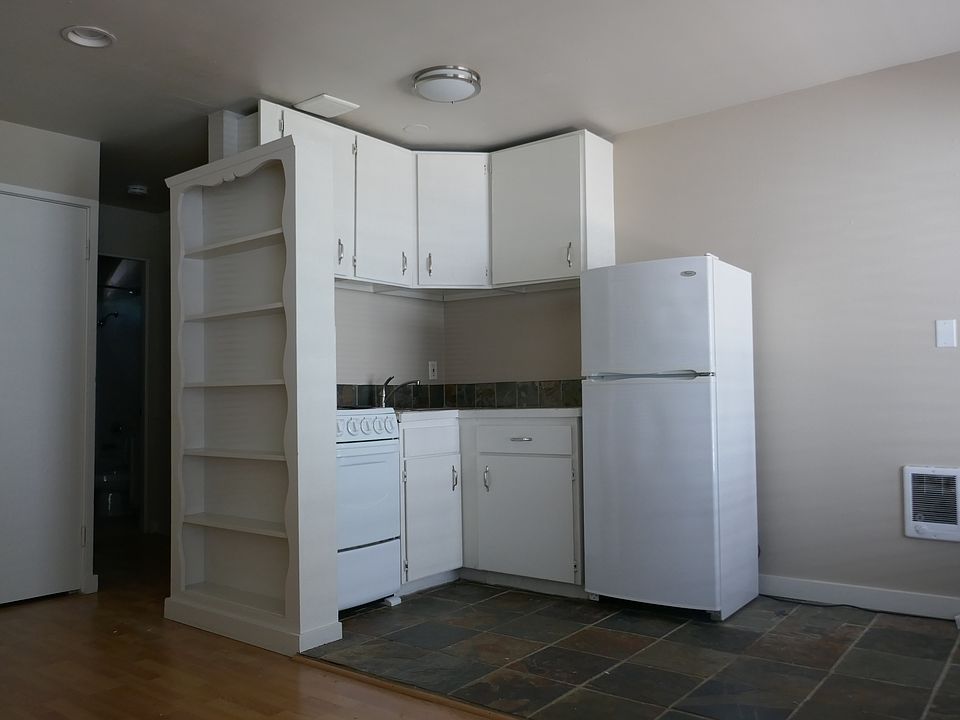 Open floor plan kitchen, compact but does the job