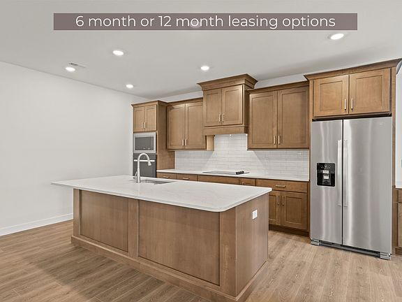 Photo is of a very similar floor plan.
