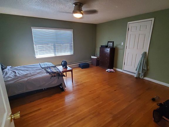 This spacious 16' x 14' primary bedroom provides ample room for a king bed, additional furniture, or a work-from-home setup.