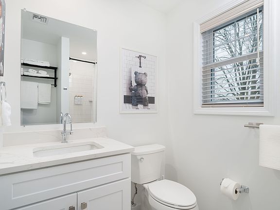 Primary bedroom features a private ensuite bathroom for added comfort and convenience.