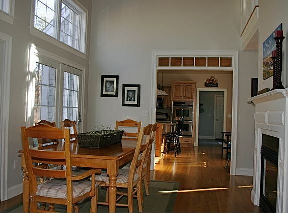 dining room opens to 2nd story and is accented by transom windows