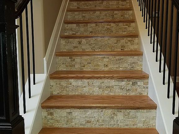 Oak stairs with travertine