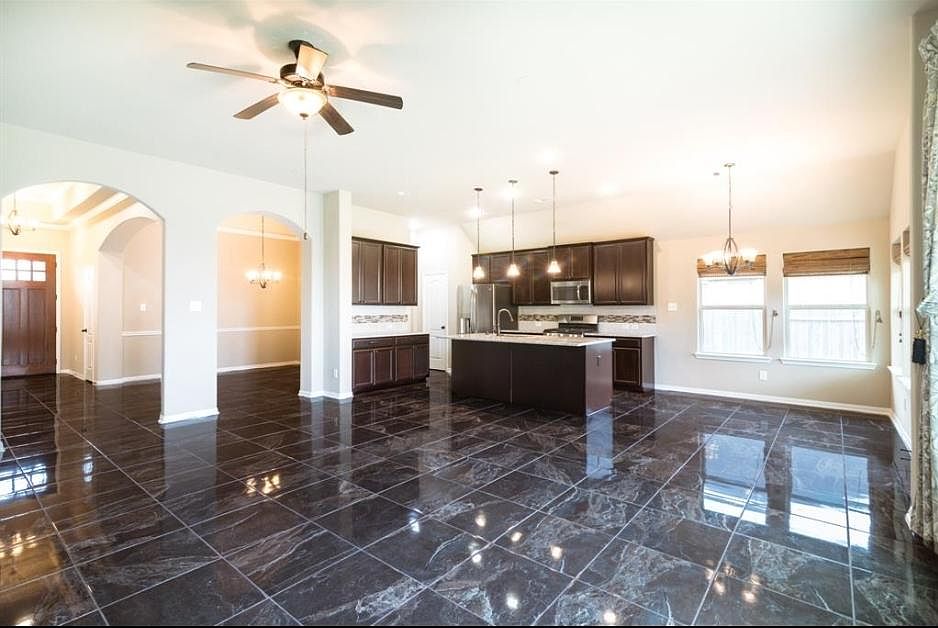 Open floor plan living, Foyer at the front door leads to the bedrooms. To the right of the front door you can see the Dining Room that has a small opening to the kitchen. on the other side of the kitchen is the breakfast nook. Then in there's just massive