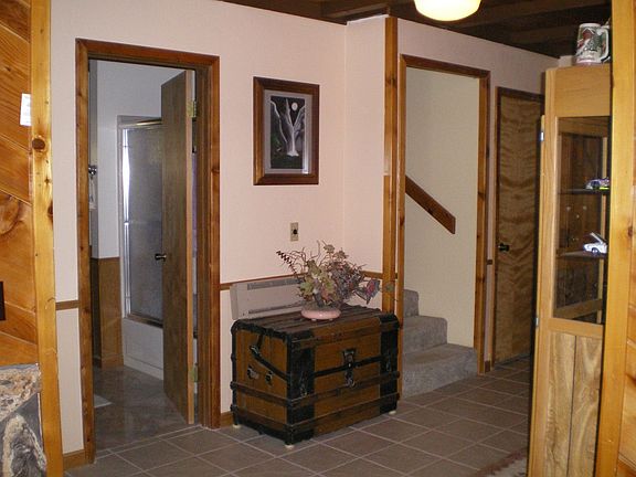 Bath door on left, stairway om right