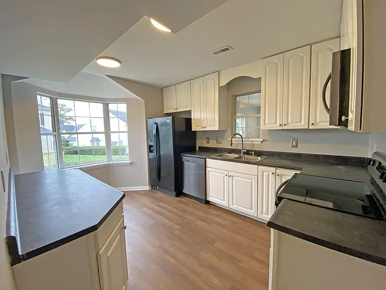 Kitchen has Lots of Natural Light with Bay Window / Breakfast Nook