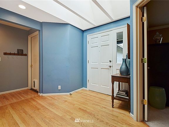 Front entry with large skylight and coat closet. Door to 2 car garage on left.