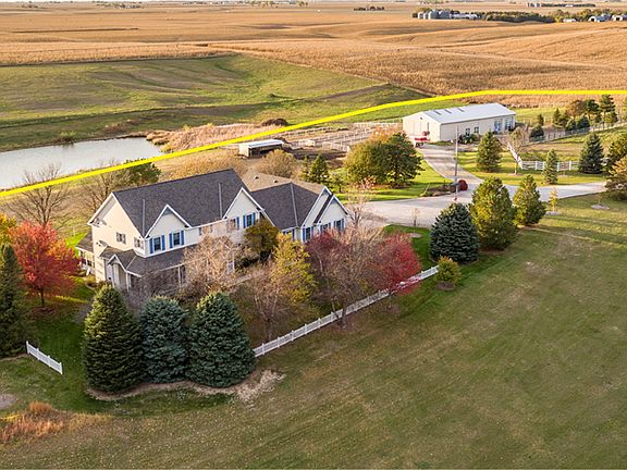 NOTE: The pond behind the house no longer exists.