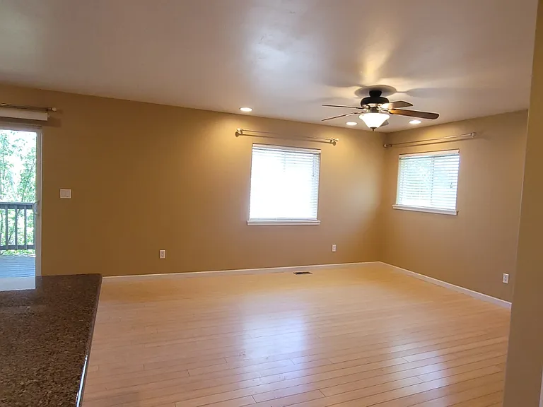 Living room door to basement on the right