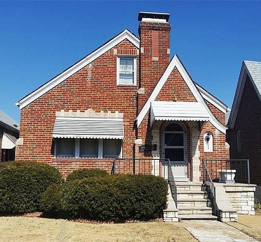 Great curb appeal! Vintage brick gingerbread ranch style home.