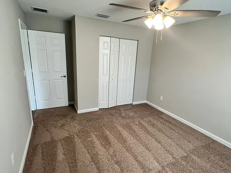 5951 NW Baynard Dr — Photo 32
