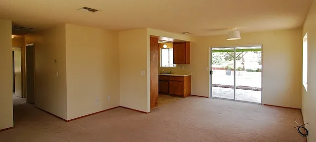 Open plan living, dining and kitchen areas. Kitchen has been updated - new photos coming soon!