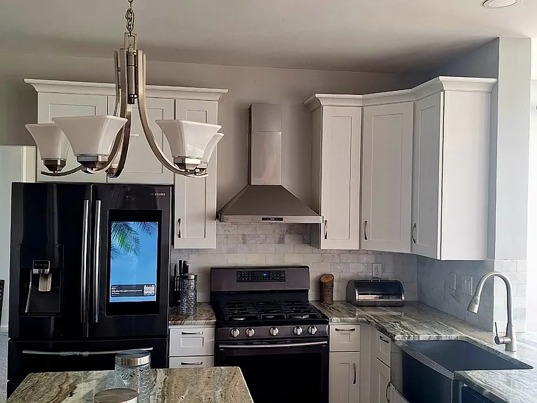 Designed for extended stays, this modern kitchen offers premium appliances, ample counter space, and all the essentials for home-cooked meals.