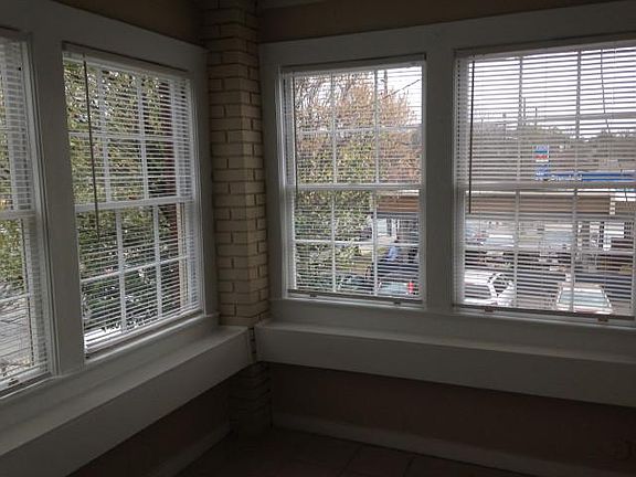 Corner view from enclosed porch could be den, office or stud
