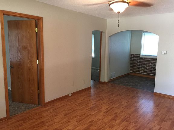 Living room with ceiling fan.