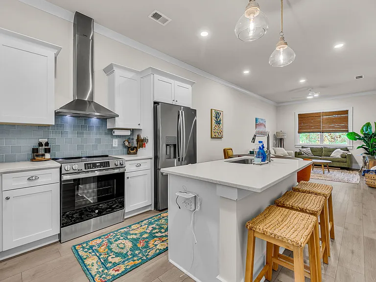 Kitchen open to dining and living