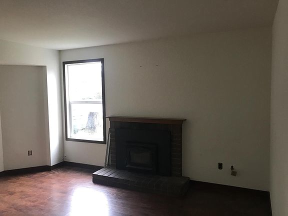Fireplace with recently installed wood insert - sit in front