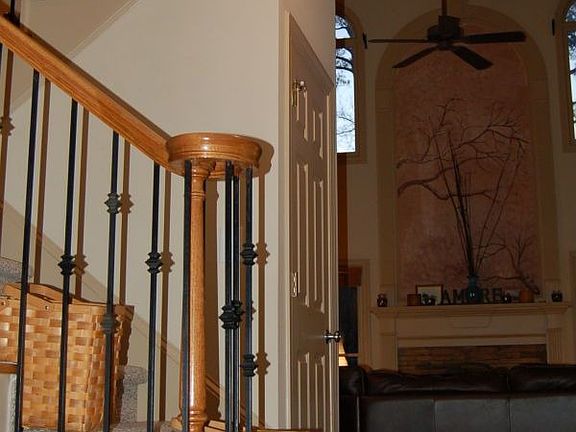 View of one of the double stairs from the foyer.