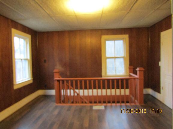 Extra room with stairs down to kitchen/dining-room