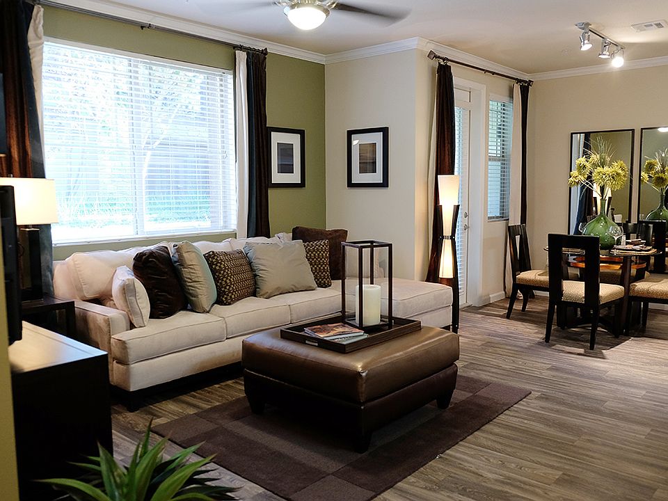 Wood inspired flooring has been added to the living spaces o